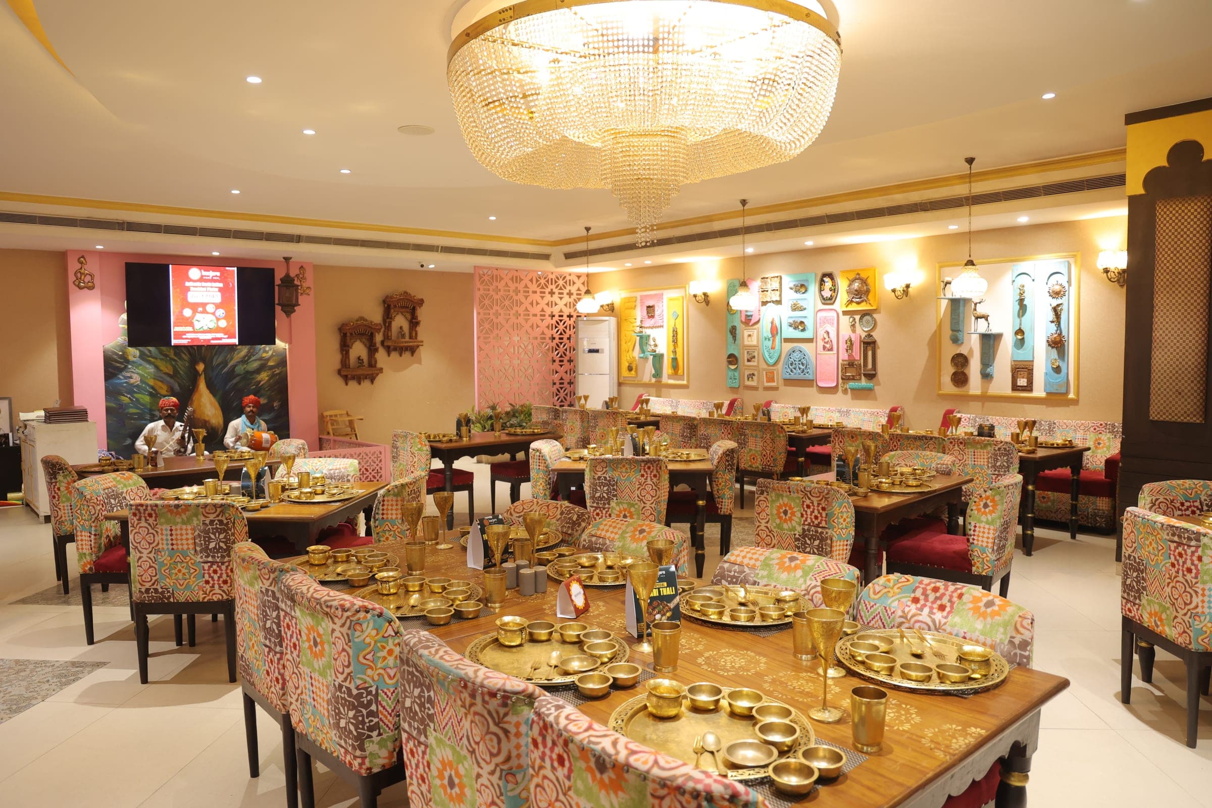 Warm interior seating and Indian decorative details at Banjara Sonari